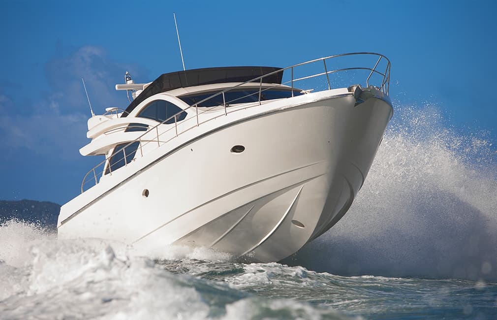 Close up of motorboat sailing among the waves