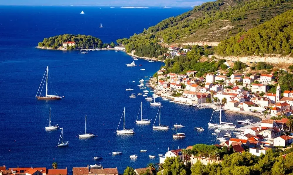 Vis on Croatian coast with many yacht sailing